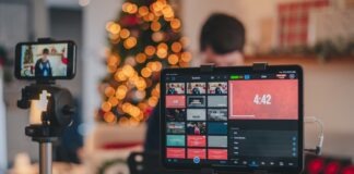 black smartphone taking photo of yellow round fruits