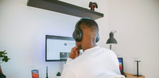 A person wearing headphones Description automatically generated with low confidence