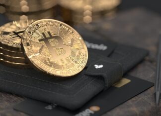 silver round coin on black leather case