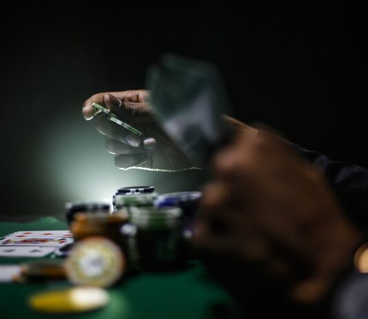 selective focus photography of poker chips