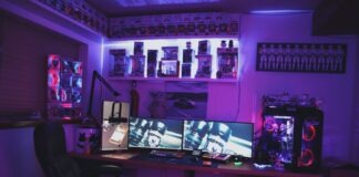 black flat screen tv on black wooden table