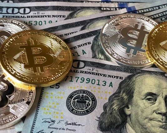 Bitcoins and U.s Dollar Bills