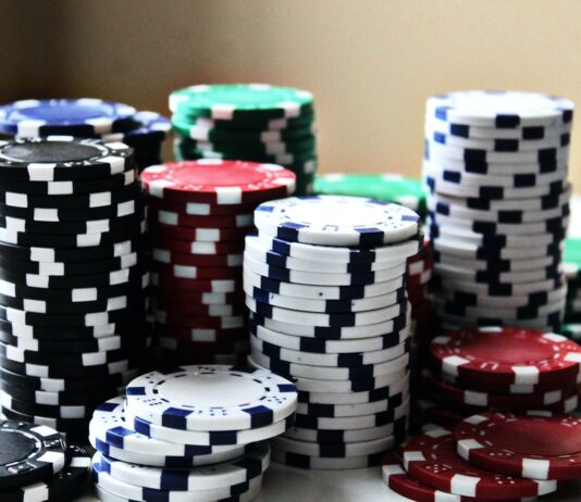 stacked poker chips with different colors