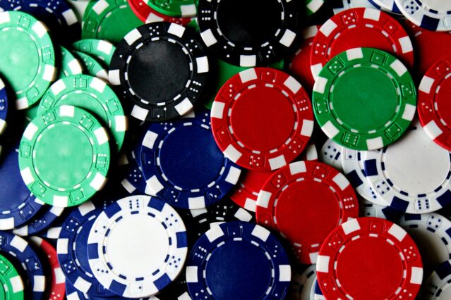 Photo by Amanda Jones scattered poker chips