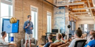 man standing in front of group of men