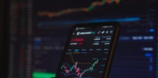 black android smartphone on brown wooden table