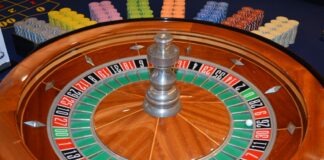 brown and silver round analog clock