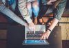 How To Find Out The Perfect Betting Site? three person pointing the silver laptop computer