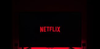 flat screen television displaying Netflix logo