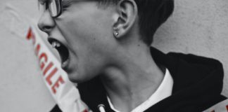 selective color photography of person portraying of being fragile