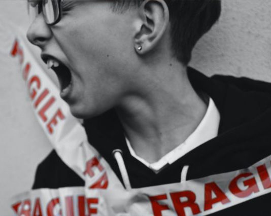 selective color photography of person portraying of being fragile