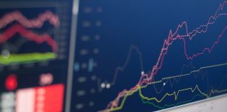 close-up photo of monitor displaying graph