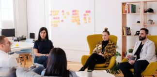 people seated on table in room