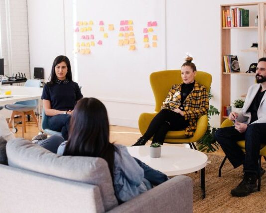 people seated on table in room