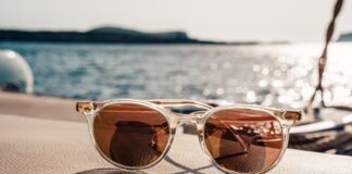 white framed brown lens sunglasses