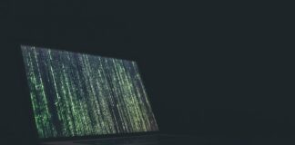 black and gray laptop computer turned on