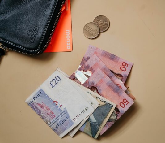 10 and 20 banknotes on white table