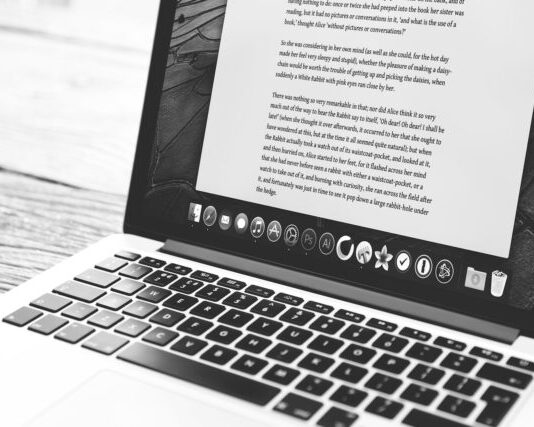 silver MacBook showing application