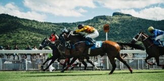 man riding horse in race