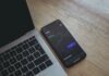 black android smartphone on macbook pro