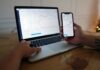 macbook pro on brown wooden table