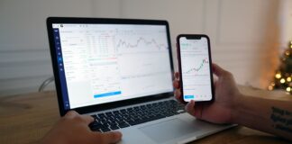 macbook pro on brown wooden table