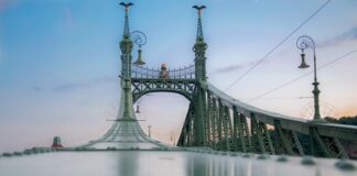 grey bridge under clear blue sky