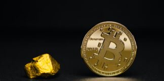 round gold-colored bit coin