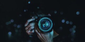 person holding black camera