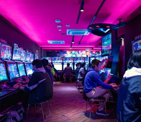 people sitting on chair in front of table