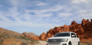 parked white Ford Explorer SUV