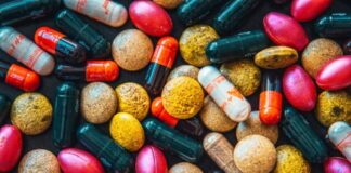 red and brown medication pill