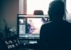 person editing photo on computer