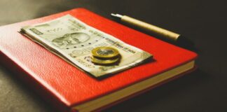 two coins on banknotes