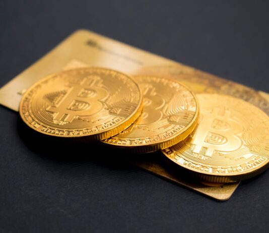 ma tokeni atatu ozungulira agolide a Bitcoin