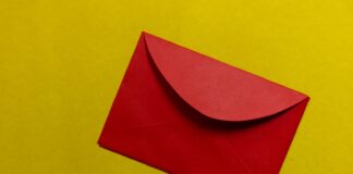 red paper on yellow surface