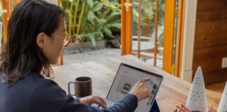 a woman using a laptop