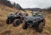 black and gray atv on brown field during daytime