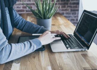 person using laptop