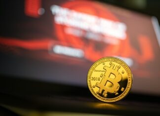 round gold-colored bit coin