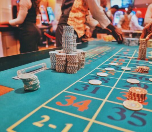 a casino table with a lot of chips on it