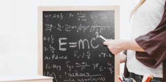 E-mc2 written on chalkboard