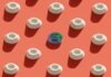 a red background with many white circles