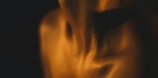 a blurry photo of a person's torso