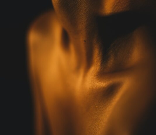 a blurry photo of a person's torso