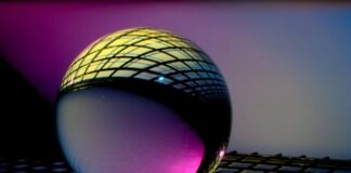 blue and black ball on blue and white checkered textile