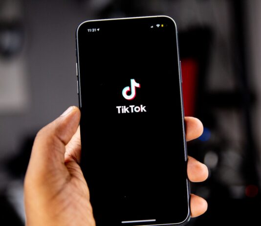 person holding black iphone 5