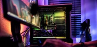 a person working on a computer in a dark room