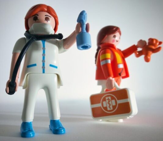 boy in blue and white suit plastic toy