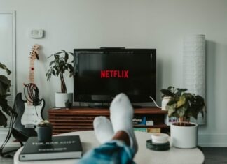 black flat screen tv turned on displaying 11